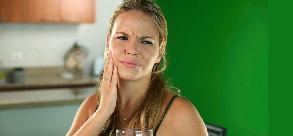 TOP HOME REMEDIES TO CURB TEETH SENSITIVITY