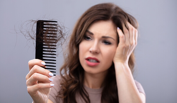 Suffering From Summer Hair Loss? 3 Tips To Protect Your Hair From Falling Out